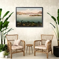 «Италия. Озеро Маджоре, остров Белла и Мадре» в интерьере комнаты в стиле ретро с плетеными креслами