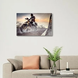«Мотоциклист на городском мосту» в интерьере современной светлой гостиной над диваном
