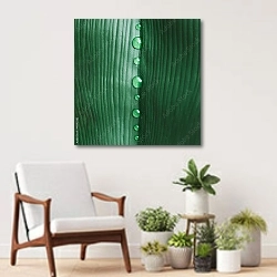 «Сгиб зеленого листа с каплями росы» в интерьере современной комнаты над креслом