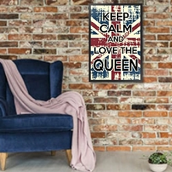 «Keep calm and love the queen» в интерьере в стиле лофт с кирпичной стеной и синим креслом