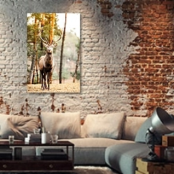 «Олень в сосновом лесу» в интерьере гостиной в стиле лофт с кирпичной стеной