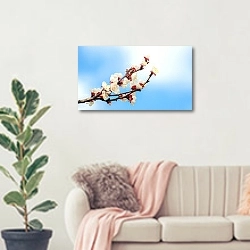 «Ветка цветущего абрикосового дерева» в интерьере современной светлой гостиной над диваном