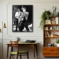 «Элвис Пресли» в интерьере кабинета в стиле ретро над столом