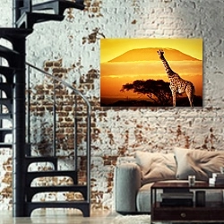 «Жираф на фоне Килиманджаро на закате» в интерьере двухярусной гостиной в стиле лофт с кирпичной стеной