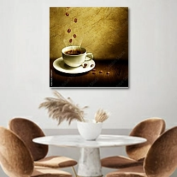 «Чашка кофе с падающими зернами на темном фоне» в интерьере кухни над кофейным столиком