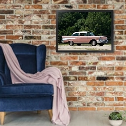 «Chevrolet Bel Air 2-door Sedan '1957» в интерьере в стиле лофт с кирпичной стеной и синим креслом