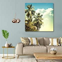 «Пальмы на фоне неба» в интерьере современной гостиной с голубыми стенами