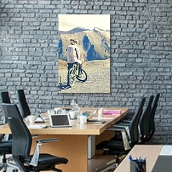 «Горный велосипедист на фоне скалы» в интерьере современного офиса с черной кирпичной стеной