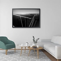 «История в черно-белых фото 214» в интерьере гостиной в скандинавском стиле с зеленым креслом