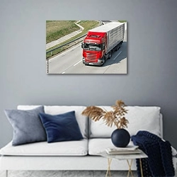 «Красный грузовик на автобане» в интерьере современной гостиной в синих тонах