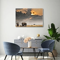 « Африканский закат со слонами» в интерьере современной гостиной над комодом