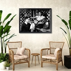 «Dean, James (Rebel Without A Cause) 4» в интерьере комнаты в стиле ретро с плетеными креслами