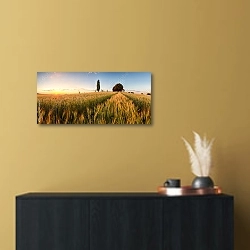 «Словакия. Закат над пшеничным полем с часовней» в интерьере современной квартиры над комодом