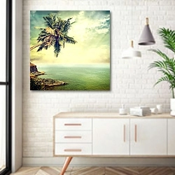«Пальма на берегу» в интерьере комнаты в скандинавском стиле над тумбой