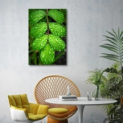 «Веточка с зелеными листьями в каплях» в интерьере современной гостиной с желтым креслом