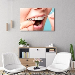 «Чистка зубов зубной нитью» в интерьере офиса над шкафом с документами