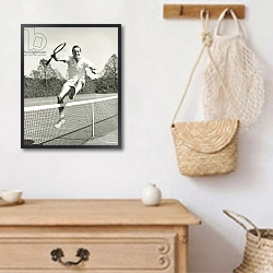 «Man holding tennis racquet leaping over tennis net, 1950-60s, black and white» в интерьере в стиле ретро над комодом