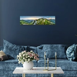 «Горные вершины на фоне заката» в интерьере стильной синей гостиной над диваном