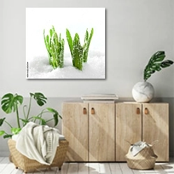 «Зеленая трава, растущая из-под снега» в интерьере современной комнаты над комодом