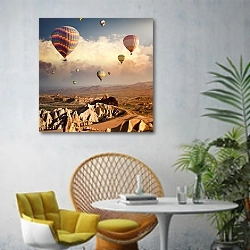 «Каппадокия, воздушные шары над долиной» в интерьере современной гостиной с желтым креслом