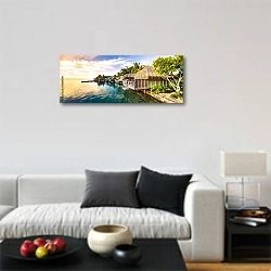 «Закат на одиноком острове в Тихом океане» в интерьере минималистичной гостиной над диваном