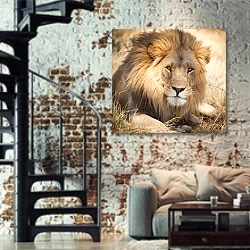 «Лев в Африке» в интерьере двухярусной гостиной в стиле лофт с кирпичной стеной