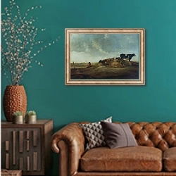 «Пастух с семью коровами у реки» в интерьере гостиной с зеленой стеной над диваном
