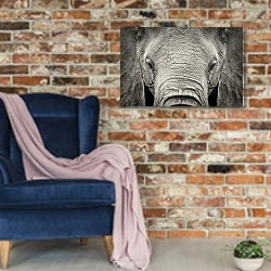 «Портрет слона» в интерьере в стиле лофт с кирпичной стеной и синим креслом