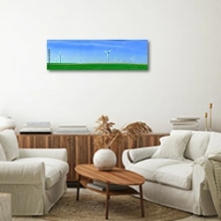 «Панорама с ветряными турбинами» в интерьере современной светлой гостиной над комодом