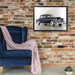 «Chrysler New Yorker Sedan '1949» в интерьере в стиле лофт с кирпичной стеной и синим креслом
