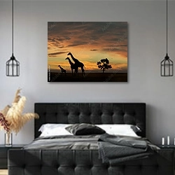 «Жирафы на фоне заката» в интерьере современной спальни с черной кроватью