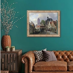 «Вид на Аудеватер» в интерьере гостиной с зеленой стеной над диваном