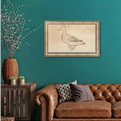 «White-faced Whistling Duck» в интерьере гостиной с зеленой стеной над диваном