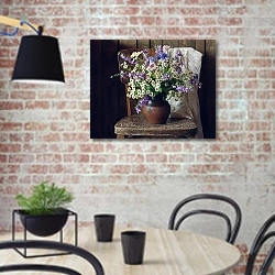 «Натюрморт с полевыми ромашками» в интерьере современной кухни с кирпичной стеной