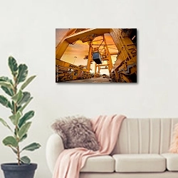 «Работа манипулятора в порту» в интерьере современной светлой гостиной над диваном
