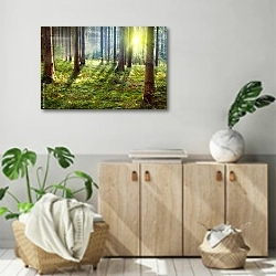 «Рассвет в лесу» в интерьере современной комнаты над комодом