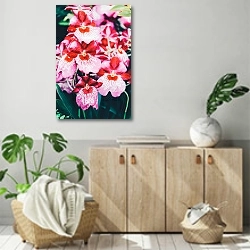«Куст розовых орхидей» в интерьере современной комнаты над комодом
