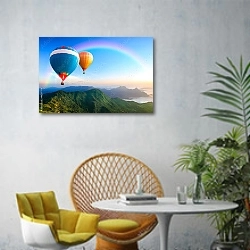 «Воздушные шары. Полет над горами» в интерьере современной гостиной с желтым креслом