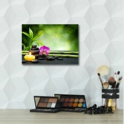 «Purple orchid, candle, with stones , bamboo on black mat» в интерьере салона красоты
