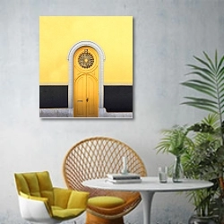 «Желтая резная дверь» в интерьере современной гостиной с желтым креслом