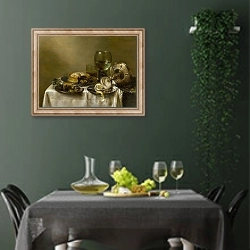 «A still life with an overturned silver tazza, glassware, pies and a peeled lemon on a table» в интерьере столовой в зеленых тонах