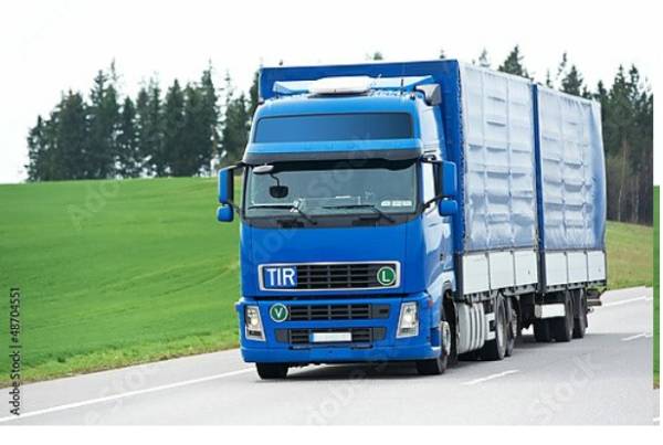 Постер Синий грузовик с синим трейлером на шоссе с типом исполнения На холсте без рамы