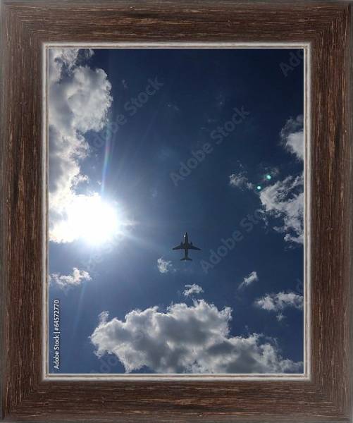 Постер Самолет в синем небе с типом исполнения На холсте в раме в багетной раме 221-02