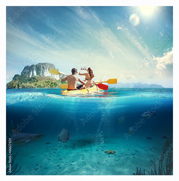 Постер Молодая пара на каяке у тропического острова с типом исполнения На холсте в раме в багетной раме 221-03