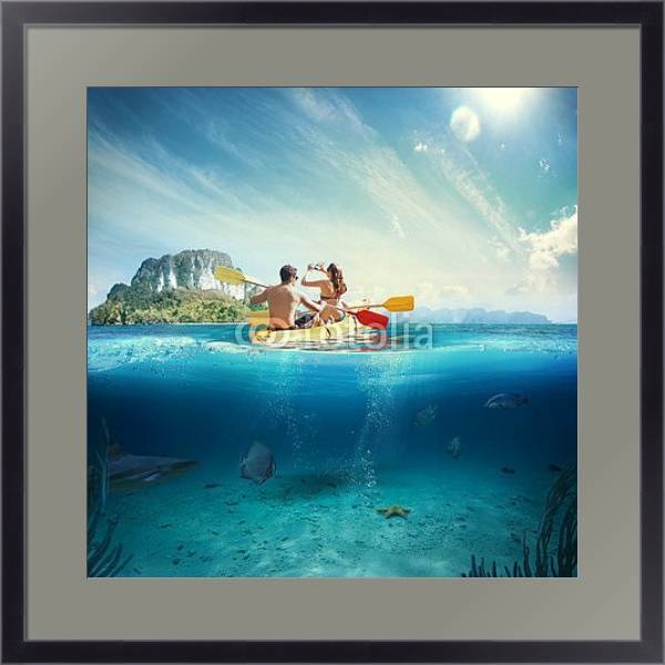 Постер Молодая пара на каяке у тропического острова с типом исполнения Под стеклом в багетной раме 221-01