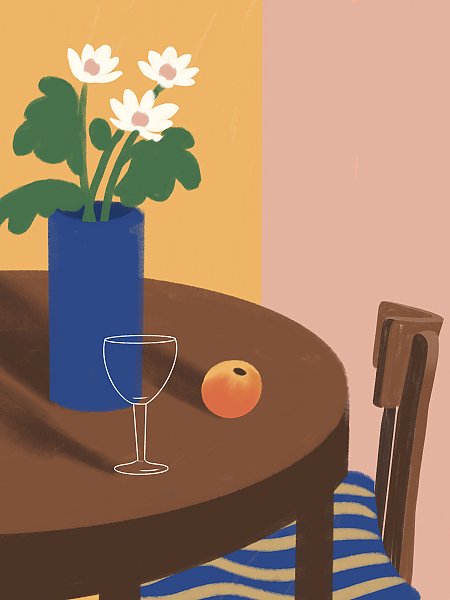 A peach and a wine glass