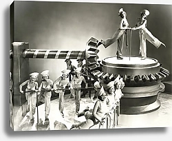 Постер Chorus girls dancing on machine part