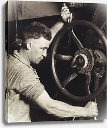Постер Хайн Льюис (фото) An Industrial Design: Pennsylvania Rubber Co. at the Control Wheel of a Great Calendar - Making Auto Tires, 1920s, printed 1930s