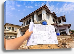 Постер architecture drawings in hand on big house building