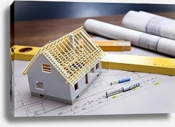 Постер Construction plans and blueprints on wooden table